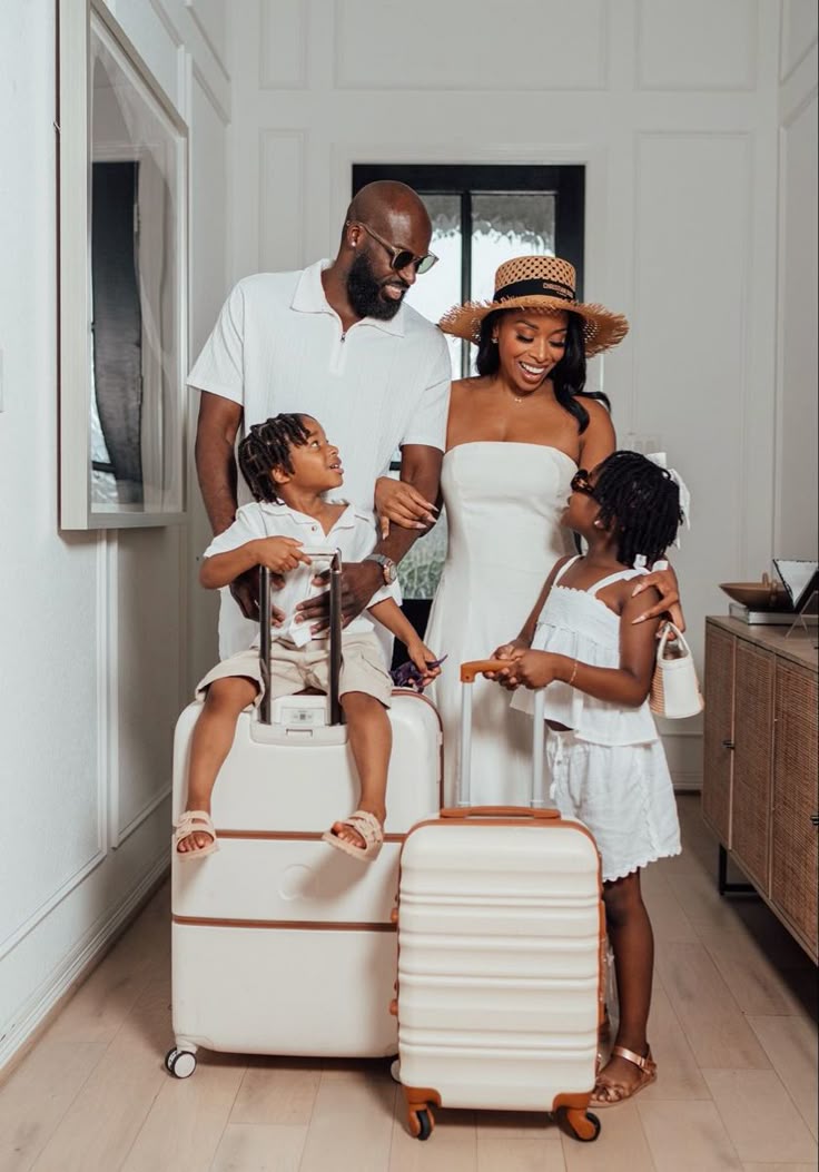 Family with luggage ready for a holiday